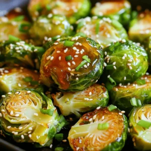 To make Honey Sriracha Brussels Sprouts, gather the following ingredients: - 1 pound Brussels sprouts, trimmed and halved - 3 tablespoons olive oil - 2 tablespoons honey - 2 tablespoons Sriracha sauce - 1 teaspoon garlic powder - Salt and pepper to taste - Optional garnish: 1 tablespoon sesame seeds - Optional garnish: 2 green onions, chopped Each ingredient plays a key role. The Brussels sprouts give a hearty base. Olive oil helps to crisp them up. Honey adds sweetness, while Sriracha brings heat. Garlic powder enhances flavor. Salt and pepper bring everything together. If you want to add flair, sprinkle sesame seeds and green onions on top. You can find the full recipe in the article. Enjoy the sweet and spicy blend! - Preheat your oven to 425°F (220°C). - Line a large baking sheet with parchment paper. - In a large bowl, mix the halved Brussels sprouts, olive oil, honey, Sriracha sauce, garlic powder, salt, and pepper. - Toss well to coat each sprout evenly. - Spread the Brussels sprouts on the baking sheet, cut side down. - Roast for 20-25 minutes until they are tender and crispy. I love the way the heat from the Sriracha blends with the sweetness of honey. It creates a perfect balance. The garlic powder adds a subtle depth. Remember, tossing halfway helps them cook evenly. If you want to know more, check out the Full Recipe for all the details! To get crispy Brussels sprouts, start with fresh sprouts. Make sure to trim and halve them. Oven heat is key; preheat to 425°F (220°C). Use a baking sheet lined with parchment paper. This helps with cleanup and browning. Toss the sprouts halfway through cooking. This ensures even heat and crispiness. If you skip this step, some may burn while others stay soggy. For extra flavor, think about adding spices. A pinch of cayenne or paprika can bring heat. Fresh herbs like thyme or rosemary also work great. They add depth to the sweet and spicy mix. Try different types of honey or Sriracha, too. Each honey has its own unique taste. You might prefer a lighter honey for a sweet touch. A spicier Sriracha can kick up the heat. Experiment and find your favorite mix. For the full recipe, check out the details above. {{image_2}} You can swap Brussels sprouts for other veggies. Broccoli, cauliflower, or green beans work well. Each adds a unique taste and texture. Try mixing these veggies for fun flavors. You can also explore different sauces. Instead of honey and Sriracha, use teriyaki or balsamic glaze. This change will give you a new flavor profile. Want to make this recipe vegan? Replace honey with maple syrup or agave nectar. This keeps the sweet taste without animal products. You can also make it gluten-free. Just ensure your Sriracha and any other sauces are gluten-free. For low-carb options, skip the honey or use a sugar substitute. This keeps the dish tasty while reducing carbs. Check the [Full Recipe] for more ideas on how to adapt this dish! To keep your Honey Sriracha Brussels sprouts fresh, store leftovers in the fridge. Place them in an airtight container. This helps keep the flavors intact. Make sure to cool them down first. If you plan to eat them soon, they can last up to four days. For longer storage, you can freeze them. Use a freezer-safe bag or container. Make sure to remove as much air as possible. They can last up to three months in the freezer. When you're ready to enjoy your Brussels sprouts again, reheating is key. The best method is using an oven. Preheat it to 350°F (175°C). Spread the sprouts on a baking sheet. Heat for about 10-15 minutes. This will help keep them crispy. If you're in a hurry, you can use a microwave. Place them in a microwave-safe dish. Heat in short bursts of 30 seconds. Check often to avoid sogginess. To keep that crunch, try reheating in a skillet. Just a few minutes over medium heat will do the trick. Enjoy the sweet and spicy goodness of these Brussels sprouts again! For the full recipe, check the earlier section. What do I serve with Honey Sriracha Brussels Sprouts? You can serve these sprouts with rice or quinoa. They also pair well with grilled chicken or fish. For a hearty meal, try them alongside a steak. The sweet and spicy flavors complement many dishes. Can I use frozen Brussels sprouts for this recipe? Yes, you can use frozen Brussels sprouts. Just thaw them first and pat them dry. This helps to get a nice crispy texture. The cooking time may be a bit longer, so keep an eye on them. How spicy are these Brussels sprouts? The heat level depends on how much Sriracha you use. Two tablespoons give a nice kick, but you can adjust it to your taste. If you prefer less heat, use one tablespoon of Sriracha. How do I make the recipe ahead of time? You can prepare the Brussels sprouts up to a day in advance. Toss them in the sauce and store in the fridge. When ready to cook, spread them on the baking sheet and roast as directed. Can I make this on the stovetop? Yes, you can cook these on the stovetop. Heat oil in a large pan over medium heat. Add the Brussels sprouts cut side down and cook until browned. Then, toss them with the sauce and cover to steam until tender. What are some popular side dishes to pair with it? Some great side dishes include mashed potatoes or a fresh salad. You can also serve them with roasted carrots or sweet potatoes for a colorful plate. These sides balance the flavors well. You learned how to make delicious Honey Sriracha Brussels sprouts. Using simple ingredients, we created the perfect balance of sweet and spicy flavors. I shared tips for achieving that crispy texture and ideas for variations, like different veggies or sauces. Don’t forget the best storage and reheating methods to keep them tasty. Enjoy these sprouts as a side dish or a fun main course. Cooking can be easy and satisfying. Try it out, and make it your own!