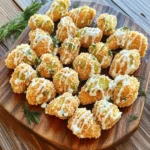 To make pickle ranch chicken bites, you need a few key items: - 1 lb boneless, skinless chicken breasts, cut into bite-sized pieces - 1 cup dill pickle juice - 1 cup all-purpose flour - 2 large eggs, beaten - 1 cup breadcrumbs (preferably panko for extra crunch) - 1/2 cup ranch dressing - Fresh dill, for garnish (optional) These ingredients come together to create a tasty and crunchy dish. The chicken absorbs the pickle juice flavor, making each bite juicy. The right seasonings make a big difference. For the chicken bites, mix these spices: - 1 teaspoon onion powder - 1 teaspoon garlic powder - 1 teaspoon paprika - 1 teaspoon black pepper - 1/2 teaspoon salt These spices add depth and flavor to the chicken. The marinade is simple but effective. The pickle juice tenderizes the chicken and adds a tangy kick. While ranch dressing pairs well with these bites, you can try other dips too. Here are some ideas: - Spicy mayo for a kick - Honey mustard for sweetness - Ketchup for classic flavor These dips can enhance the overall experience of the chicken bites. You can mix and match to find your favorite. For the full recipe, check out the detailed instructions above. Start by marinating the chicken. In a bowl, mix the chicken pieces with dill pickle juice. Make sure every piece is covered. This juice gives the chicken a tangy and bold flavor. Cover the bowl and place it in the fridge. Let it marinate for at least one hour. If you have more time, letting it sit overnight works even better. The longer it soaks, the better the taste. Next, set up your breading station. Use three bowls for this process. In the first bowl, combine the flour, onion powder, garlic powder, paprika, black pepper, and salt. This blend adds both flavor and crunch. In the second bowl, beat the eggs until smooth. In the third bowl, fill it with the breadcrumbs. I like to use panko for extra crispiness. Now, you have everything ready to coat the chicken. Now it’s time to cook! Preheat your oven to 400°F (200°C). Line a baking sheet with parchment paper or spray it lightly with cooking spray. Take the marinated chicken out and pat it dry with paper towels. This step helps the coating stick better. Dredge each piece in the seasoned flour first. Shake off any extra flour. Next, dip it in the beaten eggs, followed by a good coating of breadcrumbs. Place the breaded chicken bites on the baking sheet, leaving space between them. Bake the chicken bites for 15 to 20 minutes. They should turn golden brown and crispy. To check if they are done, the internal temperature should reach 165°F (75°C). Once cooked, transfer the bites to a serving platter. Drizzle with ranch dressing and sprinkle with fresh dill if you like. Enjoy these flavorful bites as a snack or a main dish. For the complete recipe, refer to the Full Recipe section. To get the best crunch, use panko breadcrumbs. They give a light, airy texture. Make sure to pat the chicken dry after marinating. This step helps the coating stick better. Also, arrange the chicken bites in a single layer on the baking sheet. This allows hot air to circulate around them while cooking. Lastly, bake until they are golden brown. This ensures a crispy finish. One common mistake is not marinating long enough. For maximum flavor, marinate the chicken for at least one hour. Another mistake is overcrowding the baking sheet. If the bites are too close together, they can steam instead of bake. Avoid using too much flour when coating. This can lead to a thick, gummy layer instead of a nice crunch. Always shake off excess flour before breading. To boost the taste, try adding spices to the flour mix. A pinch of cayenne can add heat, while lemon zest can brighten the flavor. You might also blend some ranch seasoning into the breadcrumbs. This adds an extra kick. For a tangy twist, drizzle extra pickle juice over the chicken bites before serving. Fresh dill or chives as a garnish can add a fresh touch, too. For the full recipe, check out the details above. {{image_2}} You can change the flavor of your Pickle Ranch Chicken Bites easily. Try adding hot sauce to the egg mixture. This gives a nice kick. You can also use smoked paprika for a deeper flavor. For a zesty touch, mix lemon zest into the flour. If you want a sweet twist, honey mustard can replace ranch dressing. Experimenting with spices can make this dish exciting. If you have dietary restrictions, you can make swaps. For gluten-free options, use almond flour or a gluten-free blend instead of all-purpose flour. Instead of ranch dressing, try a dairy-free version made from cashews. For a low-carb option, substitute chicken with cauliflower bites. Each swap keeps the essence of the dish while fitting your needs. You have options for cooking methods. Air frying gives you a crispy texture with less oil. Set your air fryer to 400°F and cook for 10-12 minutes. Flip halfway for even cooking. If you prefer frying, heat oil in a pan over medium heat. Fry the bites for about 3-4 minutes per side until golden brown. Each method can enhance the flavor and texture of your chicken bites. For the complete recipe, check out the Full Recipe section. Store your leftover Pickle Ranch Chicken Bites in an airtight container. Let them cool first. Place a paper towel at the bottom to absorb moisture. This helps keep them crispy. You can keep them in the fridge for up to three days. If you want them to last longer, freezing is a great option. To reheat your chicken bites, use the oven for the best results. Preheat your oven to 350°F (175°C). Spread the chicken bites on a baking sheet. Heat them for about 10 to 15 minutes. Check to ensure they reach an internal temperature of 165°F (75°C). This keeps them crispy and delicious. You can also use an air fryer at 350°F for about 5-7 minutes. If you want to freeze your chicken bites, do it before cooking. After breading, place them on a baking sheet lined with parchment paper. Freeze until solid, then transfer to a freezer bag. They can last up to three months in the freezer. When ready to cook, bake them straight from frozen, adding a few extra minutes to the cooking time. For best results, try the Full Recipe for clear guidance on preparation. Pickle Ranch Chicken Bites can last for about 3 to 4 days in the fridge. It's best to store them in an airtight container. This keeps them fresh and safe to eat. If you want to enjoy them later, just reheat them before serving. This helps regain some of the crispiness. Yes, you can use frozen chicken for this recipe. Just make sure to thaw it completely before marinating. You can do this overnight in the fridge or use the microwave. Thawing ensures the chicken absorbs the pickle juice well. This step is key for flavor and texture. You can serve Pickle Ranch Chicken Bites with a variety of sides. They pair well with fresh veggies, like carrot sticks or celery. A simple salad or coleslaw also complements them nicely. For dipping, ranch dressing is a perfect match. You can also try honey mustard or a spicy aioli for extra flavor. In this post, we covered all you need to know about making Pickle Ranch Chicken Bites. We explored the key ingredients and provided clear steps for marinating and baking. You learned tips for crispiness and common mistakes to avoid. We also discussed variations to suit your taste and dietary needs. Remember, these bites are versatile and fun. Enjoy creating your own twist and share them with friends and family!