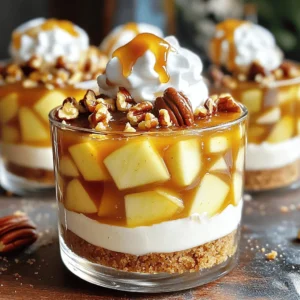 For these delightful Caramel Apple Pecan Pie Cheesecake Cups, gather the following: - 1 cup graham cracker crumbs - 1/4 cup melted butter - 2 cups cream cheese, softened - 1/2 cup granulated sugar - 1/2 cup brown sugar - 1 teaspoon vanilla extract - 2 large eggs - 2 cups diced apples (preferably Granny Smith) - 1/2 teaspoon cinnamon - 1 cup pecans, chopped - 1 cup caramel sauce (store-bought or homemade) - Whipped cream (for topping) You can easily swap some ingredients if needed. Here are a few ideas: - Use almond flour instead of graham cracker crumbs for a gluten-free crust. - Replace butter with coconut oil for a dairy-free option. - If you don’t have cream cheese, try mascarpone cheese for a rich flavor. - You can use any sweet apple if Granny Smith is not available. - For a nut-free option, simply omit the pecans or use sunflower seeds. Selecting fresh ingredients makes a big difference in taste. Here’s how to pick the best apples and pecans: - Apples: Choose firm apples with smooth skin. Look for a shiny surface. Avoid soft or bruised ones. Granny Smith apples are tart and hold their shape well when baked. - Pecans: Opt for pecans that smell fresh and nutty. Check for any signs of moisture or mold. Buy whole pecans for better flavor. Chop them right before using for a fresher crunch. These tips ensure your Caramel Apple Pecan Pie Cheesecake Cups are a hit! First, preheat your oven to 325°F (160°C). In a mixing bowl, combine 1 cup of graham cracker crumbs and 1/4 cup of melted butter. Mix well until the crumbs soak up the butter. Next, press this mixture evenly into the bottom of each muffin cup. This forms the crust base. Bake for 10 minutes, then remove and let cool. In a separate bowl, beat together 2 cups of softened cream cheese, 1/2 cup of granulated sugar, 1/2 cup of brown sugar, and 1 teaspoon of vanilla extract. Mix until the blend is smooth and creamy. Now, add 2 large eggs, one at a time. Mix thoroughly after each addition. Gently fold in 2 cups of diced Granny Smith apples and 1/2 teaspoon of cinnamon into the cream cheese mixture. Pour the cream cheese filling evenly into the muffin cups, over the cooled graham cracker crust. Fill each cup about 2/3 full. Next, sprinkle 1 cup of chopped pecans on top of the batter in each cup. Bake these in the preheated oven for 20-25 minutes. Watch closely to avoid overbaking. The edges should be set, and the center should jiggle slightly but remain firm. Once baked, remove them from the oven and cool to room temperature. Refrigerate for at least two hours before serving. When ready to enjoy, drizzle caramel sauce over each cheesecake cup and add a dollop of whipped cream if you like! To get a creamy cheesecake, start with softened cream cheese. This helps mix smoothly. Beat the cream cheese and sugars well until they are light and fluffy. Avoid overmixing after adding eggs. This keeps air bubbles from forming, which can cause cracks. Baking at the right temperature is key. Preheat your oven to 325°F (160°C). Bake the cheesecake cups until the edges are set, but the center should still jiggle a bit. This means they are done but not overcooked. Keep a close watch during the last few minutes. Serve your cheesecake cups in clear cups to show off those lovely layers. Drizzle warm caramel sauce over each cup just before serving. Add a dollop of whipped cream on top. For extra flair, sprinkle chopped pecans on each cup. This not only looks great but adds a nice crunch. {{image_2}} You can switch up the fruit in these cheesecake cups. Try using pears or peaches. Both add a sweet twist. For a berry option, use fresh blueberries or strawberries. They bring a nice tartness. You can mix fruits too! Combine apples with raspberries for a fun flavor. To make these cheesecake cups gluten-free, use gluten-free graham crackers. Check the label for safe grains. For a dairy-free option, swap cream cheese for a dairy-free version. Use coconut cream or cashew cream as a base. These swaps keep the taste close while meeting dietary needs. When autumn comes, add pumpkin spice to the mix. Just a pinch of nutmeg can bring warmth. In spring, use lemon zest for a fresh flavor. For summer, top with fresh berries and a mint leaf. Each season has fruits that can make these cups special for any event. Store your caramel apple pecan pie cheesecake cups in the fridge. Use an airtight container to keep them fresh. This helps maintain their creamy texture and flavor. If you have leftover whipped cream, store it separately. This keeps it fluffy and light. Always place a layer of plastic wrap over the top to prevent drying out. These cheesecake cups last about five days in the fridge. After that, the quality may drop. You might notice the crust getting soggy. If they smell off or look different, it’s best to toss them. Always use your best judgment when it comes to food safety. You can freeze these cheesecake cups for up to three months. Just make sure they are fully chilled first. Use a freezer-safe container or plastic wrap to prevent ice crystals. When ready to eat, thaw them in the fridge overnight. This way, they stay creamy and delicious. Always add fresh whipped cream and caramel sauce before serving for the best taste. Yes, you can make these cheesecake cups ahead of time. Prepare them a day before your event. Once they cool, chill them in the fridge for at least two hours. They will taste just as good, if not better, after a night in the fridge. Just wait to add the caramel sauce and whipped cream until serving time. If you do not have caramel sauce, you can use butterscotch sauce. It adds a similar sweet flavor. You can also make a simple maple syrup topping. Just warm maple syrup and drizzle it over the cheesecake cups. For a fun twist, try a chocolate sauce instead for a different taste. Check the edges of the cups. They should look set and firm. The center may still jiggle slightly. If the edges are golden brown, it’s a good sign. Bake for 20-25 minutes to avoid overcooking. Remove them from the oven and let them cool to firm up. This blog post covered everything you need for caramel apple pecan pie cheesecake cups. We explored ingredients, including fresh apples and pecans, and discussed substitutions. I shared step-by-step instructions for the crust, filling, and assembly. You learned tips to get the right texture and how to serve them nicely. Variations and storage tips were included as well. With these insights, you can create tasty treats for any occasion. Enjoy making your cheesecake cups and share your delicious results!