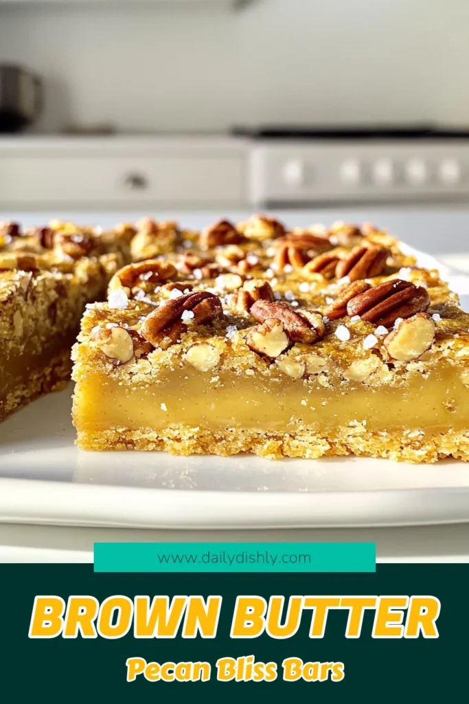 Indulge in the rich flavors of these Brown Butter Maple Pecan Shortbread Bars! With golden brown butter, sweet maple syrup, and crunchy pecans, these delectable treats are perfect for any occasion. Follow our simple recipe for a delicious dessert that will wow your friends and family. Don't miss out—click to explore the full recipe and make your kitchen smell amazing! #ShortbreadBars #MaplePecan #BakingRecipes #DessertDelight