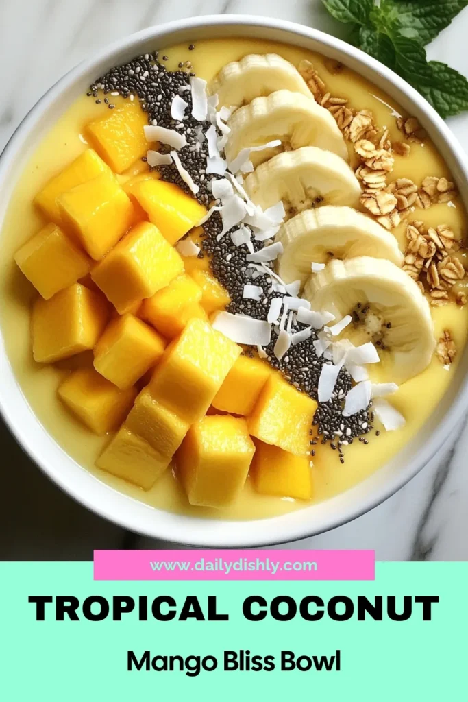 Indulge in this delicious Coconut Mango Smoothie Bowl that brings tropical vibes to your breakfast! This creamy mango smoothie blends ripe mango, coconut milk, and banana for a refreshing start to your day. Top your bowl with healthy toppings like sliced bananas, chia seeds, and granola for a nutritious twist. Discover this easy smoothie bowl recipe today and brighten your mornings! Save this recipe for your next brunch! #SmoothieBowl #CoconutMango #HealthyRecipes #TropicalVibes