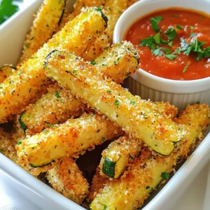 - 2 medium zucchinis, cut into strips - 1 cup grated Parmesan cheese - 1 cup breadcrumbs (panko for extra crunch) - 2 large eggs, beaten - 1 teaspoon garlic powder - 1 teaspoon dried oregano - 1/2 teaspoon paprika - Salt and pepper to taste - Olive oil spray for cooking To make Parmesan crusted zucchini fries, you need simple, fresh ingredients. First, grab your zucchinis. They should be firm, not soft. The Parmesan cheese gives the fries a rich flavor. I suggest using freshly grated cheese for the best taste. Next, you'll need breadcrumbs. I recommend panko for extra crunch. The eggs help the coating stick to the zucchini. Beat them well before you start dipping. For seasoning, garlic powder adds a nice kick. Dried oregano brings a hint of earthiness, while paprika gives a touch of warmth. Do not forget salt and pepper to enhance the flavors. Finally, olive oil spray helps the fries crisp up in the oven. With these ingredients, you're ready to create a tasty snack that everyone will love! {{ingredient_image_1}} - Preheat Oven: First, set your oven to 425°F (220°C). This hot temperature helps the fries get crispy. - Prepare Baking Sheet: Line your baking sheet with parchment paper. This makes for easy clean-up. - Combine Parmesan and Breadcrumbs: In a shallow bowl, mix 1 cup of grated Parmesan cheese with 1 cup of breadcrumbs. Add 1 teaspoon of garlic powder, 1 teaspoon of dried oregano, and 1/2 teaspoon of paprika. Season with salt and pepper. Stir until combined. - Beat the Eggs: In another shallow bowl, crack 2 large eggs. Beat them well until they are mixed. - Dip Zucchini in Eggs: Take each zucchini strip and dip it into the beaten eggs. Let the extra egg drip off. - Coat in Parmesan-Breadcrumb Mixture: Next, roll the zucchini strip in the Parmesan-breadcrumb mix. Press gently so the coating sticks well. - Space Zucchini on Baking Sheet: Place the coated zucchini fries on your baking sheet. Make sure to leave space between each fry for even cooking. - Spray with Olive Oil: Lightly spray the tops of the zucchini fries with olive oil. This helps them crisp up in the oven. - Bake and Flip: Bake the fries for 20-25 minutes. Flip them halfway through to ensure they cook evenly. Look for a golden brown color to know they are ready. These steps will help you enjoy crunchy, tasty Parmesan crusted zucchini fries in no time. - Use Panko Breadcrumbs: Panko breadcrumbs are lighter and crispier than regular ones. They create a great crunchy texture. This is key to making your zucchini fries stand out. - Olive Oil Application: Spray olive oil on the fries before baking. This helps them crisp up nicely. A light coating of oil works wonders for that golden finish. - Presentation Ideas: Serve your zucchini fries in a small basket or on a colorful platter. This makes them look appealing and fun. You can also garnish with fresh parsley for a nice touch. - Dipping Sauces: Pair your fries with marinara sauce or garlic aioli. These sauces add flavor and make the fries even more enjoyable. You can try making your own sauce for a twist. - Baking Duration: Bake the fries for about 20-25 minutes. Flipping them halfway through ensures they cook evenly. Look for a golden brown color to know they’re done. - Oven Temperature Tips: Set your oven to 425°F (220°C) to get that perfect crunch. This high temperature helps to achieve a crispy exterior while keeping the inside tender. Pro Tips Choose Fresh Zucchini: Fresh, firm zucchinis will yield the best texture and flavor for your fries. Look for ones that are not too large, as they can be more watery. Experiment with Seasoning: Feel free to mix in your favorite herbs and spices into the breadcrumb mixture for a personalized flavor. Try adding Italian seasoning or crushed red pepper for a kick! Use Parchment Paper: Lining your baking sheet with parchment paper not only prevents sticking but also ensures that the fries crisp up nicely without burning. Serve Immediately: For the best eating experience, serve the zucchini fries right out of the oven while they are still hot and crispy. They tend to lose their crunch if left out too long. {{image_2}} Spices and Herbs You can spice up your fries with different herbs and spices. Try adding cayenne for heat or thyme for a fresh taste. You can also use Italian seasoning for a nice blend. Simply mix these into the Parmesan and breadcrumb mixture. This will give your fries a new twist. Cheese Variations Swap Parmesan for other cheeses if you want. Try using Asiago or Pecorino for a sharper flavor. You can also mix in some mozzarella for a cheesy pull. Just remember to adjust the amount based on how strong you want the flavor. Air Fryer Method If you want a quicker method, use an air fryer. Preheat it to 400°F (200°C). Follow the same steps for coating the zucchini. Place the fries in the air fryer basket in a single layer. Cook for about 10-12 minutes, flipping halfway for even crispiness. This method reduces oil and keeps them light. Grilling Option For a smoky flavor, try grilling the zucchini fries. Coat them as you normally would. Place them on a hot grill over medium heat. Grill for about 5-7 minutes per side. Watch them closely to avoid burning. This method adds a nice char and great taste. Gluten-Free Options You can make this dish gluten-free easily. Just switch the breadcrumbs with gluten-free panko. This keeps the crunch while being safe for those who avoid gluten. Always check labels to ensure they meet your needs. Vegan Alternatives To make this recipe vegan, replace eggs with a mixture of ground flaxseed and water. Use 1 tablespoon of flaxseed with 3 tablespoons of water to replace one egg. For cheese, try nutritional yeast mixed with breadcrumbs. This gives you a cheesy flavor without dairy. - Container Recommendations: Store your leftover zucchini fries in an airtight container. This helps keep them fresh. Glass or plastic containers with tight lids work well. You can also use a resealable plastic bag if you remove as much air as possible. - Best Practices for Freshness: Place a paper towel at the bottom of the container. This absorbs moisture and keeps the fries crisp. Store them in the fridge for up to three days. Make sure they cool down before sealing them up. - Oven vs Microwave: The oven is the best choice for reheating. Preheat it to 400°F (200°C) and bake the fries for about 10 minutes. This restores their crunch. If you use a microwave, the fries can turn soggy. If you must use the microwave, heat them for only 30 seconds. - Tips for Maintaining Crispiness: When reheating in the oven, place the fries on a baking sheet. This allows air to circulate around them. Avoid covering them with foil, as this traps steam. A light spray of olive oil before reheating can help them crisp up again. To make zucchini fries crispy, focus on two main techniques: coating and baking. - Techniques for Crispiness: Use panko breadcrumbs for a crunchier texture. Also, ensure you space the fries on the baking sheet. This helps hot air flow around them, making them crisp. - Importance of Coating: The coating is key. Mix grated Parmesan cheese with breadcrumbs. This combo adds flavor and texture. Make sure to press the mixture onto the zucchini strips. This ensures they stick well and get crispy when baked. Yes, you can prepare zucchini fries ahead of time. - Prep Tips for Future Cooking: Cut and coat the zucchini strips. Place them on a baking sheet in the fridge. This keeps them fresh until you’re ready to bake. - Freezing Options: You can also freeze the coated fries. Lay them flat on a tray to freeze. Once frozen, transfer them to a bag. To cook, bake them straight from the freezer. Just add a few extra minutes to the baking time. Zucchini fries taste great with many dips. - Best Dipping Sauce Suggestions: Marinara sauce is a classic choice. Garlic aioli also adds a nice touch. You can even try ranch dressing for a creamy option. - Homemade Sauce Recipes: To make a simple garlic aioli, mix mayonnaise with minced garlic and lemon juice. For a quick marinara, heat canned tomatoes with garlic and Italian herbs. Both sauces enhance the flavor of your fries. This blog post covers how to make delicious zucchini fries using simple ingredients. We looked at main ingredients, helpful tips, and tasty variations. You can easily achieve crispiness and explore different flavor options. Plus, I shared how to store and reheat your fries for later. Overall, these fries are a fun and tasty snack. Whether for a party or a quiet night in, they will impress everyone. Enjoy making these zucchini fries your way!