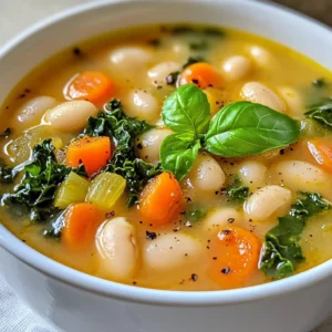 - 2 cups canned white beans (cannellini), rinsed and drained - 1 medium onion, diced - 2 cloves garlic, minced - 2 carrots, diced - 2 celery stalks, diced - 4 cups vegetable broth - 1 can (14 oz) diced tomatoes, with juices - 1 teaspoon dried thyme - 1 teaspoon dried rosemary - 1 bay leaf - 2 cups kale, chopped - 2 tablespoons olive oil - Salt and pepper to taste - Fresh basil leaves for garnish When I make Tuscan White Bean Soup, I love to use simple, fresh ingredients. Canned white beans, like cannellini, add creaminess and protein. For the best flavor, I always rinse and drain them. Diced onions, carrots, and celery form a tasty base. I chop them small for even cooking. Garlic adds a punch of flavor, so I use two cloves, minced finely. Vegetable broth is crucial for depth. I recommend a good quality broth or even homemade if you have it. The diced tomatoes bring acidity and sweetness. They add a lovely color too. Dried thyme and rosemary give the soup an earthy taste. The bay leaf adds a subtle aroma. Kale offers nutrients and a nice texture. I chop it into bite-sized pieces. Olive oil helps sauté the veggies and adds richness. I season with salt and pepper to taste. Fresh basil leaves make a beautiful garnish. They bring a fresh finish to the dish. If you don't have white beans, you can use chickpeas or black beans. Both work well and bring great flavor. For vegetable broth, you can use low-sodium or homemade. This helps control the salt level. When it comes to herbs, fresh thyme and rosemary can enhance the taste. If you only have dried herbs, that's fine too. Just use less, as dried herbs are stronger. Always adjust based on your taste. {{ingredient_image_1}} To start, heat 2 tablespoons of olive oil in a large pot over medium heat. Add the diced onion, carrots, and celery. Sauté these vegetables for about 5-7 minutes. You want them to soften, and the onion should become a bit clear. Next, add 2 minced cloves of garlic to the pot. Stir and cook for another minute until you smell that wonderful garlic aroma. This step builds a strong flavor base for your soup. Now it's time to incorporate the main ingredients. Stir in 2 cups of rinsed and drained white beans and 1 can of diced tomatoes, including their juices. Pour in 4 cups of vegetable broth too. Then, add 1 teaspoon of dried thyme, 1 teaspoon of dried rosemary, and 1 bay leaf. Bring the soup to a boil. Once boiling, reduce the heat and let it simmer uncovered for 20 minutes. This simmering allows the flavors to mingle. After 20 minutes, it’s time to add the greens. Add 2 cups of chopped kale to the pot. Continue simmering for another 10 minutes until the kale is tender. If you want a creamier soup, blend a portion of it before adding the kale. This step is optional but gives a nice texture. Finally, taste your soup. Add salt and pepper to suit your preference. Remember, seasoning makes all the difference! Using homemade vegetable broth makes a big difference. It adds rich flavor and depth. You can also add dried herbs like oregano or basil for more taste. Fresh herbs are great too! Try adding a sprinkle of red pepper flakes for heat. A splash of lemon juice can brighten up the soup. This soup keeps well in the fridge. Store it in airtight containers for up to five days. When you're ready to eat, reheat it on the stove. Add a bit of water if it seems too thick. You can also freeze the soup for up to three months. Thaw it overnight in the fridge before reheating. Serve your soup with crusty bread or a fresh salad. A sprinkle of Parmesan cheese adds a nice touch. For a beautiful presentation, drizzle olive oil on top. Arrange fresh basil leaves neatly around the bowl. This makes the soup look and taste even better. Pro Tips Use Fresh Herbs: Fresh thyme and rosemary will enhance the flavor of the soup significantly compared to dried herbs. Adjust Consistency: For a creamier soup, blend a portion of the soup before adding the kale. This will give it a rich texture. Let it Sit: Allowing the soup to sit for a few hours or overnight can deepen the flavors, making it even tastier the next day. Garnish for Freshness: Always add fresh basil just before serving for a burst of flavor and vibrant color. {{image_2}} To keep the soup vegan, use vegetable broth and omit any meat. The main ingredients, white beans and veggies, provide great flavor. You can add more vegetables if you want. Try zucchini or bell peppers for extra taste. Adding spices like smoked paprika can bring a nice kick. These options keep it hearty while ensuring it stays plant-based. If you want to add protein, chicken or sausage works well. For chicken, use cooked, shredded pieces. Stir it in during the last simmer. For sausage, slice it and brown it in the pot before adding other ingredients. This adds depth and flavor to the soup. Choose spicy or mild sausage, depending on your taste. Both protein options will make the dish more filling. You can change ingredients based on the season. In winter, add root vegetables like parsnips or sweet potatoes for warmth. Spring calls for fresh peas and asparagus for a lighter taste. In the summer, swap in fresh tomatoes instead of canned ones. Fall is perfect for adding pumpkin or squash for a cozy flavor. These swaps keep the soup fresh and exciting throughout the year. To keep your Tuscan white bean soup fresh, use an airtight container. Glass or BPA-free plastic containers work best. Make sure the soup cools down to room temperature before sealing it. This helps prevent condensation and keeps your soup tasty. If you want to freeze your soup, let it cool completely first. Pour the soup into freezer-safe bags or containers. Leave some space at the top, as the soup will expand when frozen. To reheat, thaw it in the fridge overnight. Then, warm it on the stove or in the microwave until hot. In the fridge, your soup will last about 3 to 4 days. If you freeze it, it can last for up to 3 months. Just remember to label your containers with the date. This way, you know when to enjoy your delicious soup! If your soup is too thick, you can easily fix it. Just add more vegetable broth. Start with half a cup and stir well. Keep adding in small amounts until you reach your desired consistency. You can also add water if you prefer. This method keeps the flavor strong while making the soup smoother. Yes, you can use dried beans! First, soak them overnight in water. This helps soften them. The next day, drain and rinse the beans. Then, cook them in fresh water until tender. This usually takes about one to two hours. Once cooked, add them to your soup as you would with canned beans. Using dried beans adds a fresh taste to your soup. Yes, this soup is gluten-free! All the ingredients are safe for gluten-free diets. Just make sure your vegetable broth is gluten-free too. Some brands add gluten, so check the label. Enjoy this hearty soup without worry, knowing it fits your dietary needs. This soup is a simple yet tasty dish. We combined fresh veggies, herbs, and beans to create a warm meal. Remember, you can swap ingredients to fit what you have at home. You can also personalize the soup for different seasons or diets. With smart tips on storage, you'll enjoy this dish again later. Keep experimenting to find what works best for your taste. Trust me, the more you make this soup, the more you'll love it! Enjoy your cooking journey!