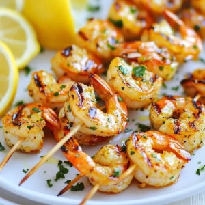 For this dish, you need simple and fresh items. Here’s what to gather: - 1 pound large shrimp, peeled and deveined - 3 tablespoons olive oil - 2 tablespoons fresh lemon juice - Zest of 1 lemon - 3 cloves garlic, minced - 1 tablespoon fresh parsley, chopped - 1 teaspoon dried oregano - 1 teaspoon paprika - Salt and pepper to taste - Lemon wedges for serving These main ingredients create a bright and zesty flavor. The shrimp is the star, while the herbs and lemon shine through. You can enhance the dish with a few extras: - A pinch of red pepper flakes for heat - Fresh thyme or cilantro for more herb flavor - A splash of white wine for depth These optional ingredients can take the dish to the next level. Feel free to mix and match based on your taste. Using fresh ingredients makes a big difference. Look for shrimp that smells clean and has a firm texture. Fresh lemon gives the best flavor, so avoid bottled juice. Good olive oil also enhances the taste. Remember, quality ingredients lead to a tasty meal. {{ingredient_image_1}} To make the marinade, grab a medium bowl. Add 3 tablespoons of olive oil and 2 tablespoons of fresh lemon juice. Next, zest one lemon and add it to the bowl. Then, mince 3 cloves of garlic and toss them in. Add 1 tablespoon of chopped fresh parsley, 1 teaspoon of dried oregano, and 1 teaspoon of paprika. Season the mix with salt and pepper. Use a whisk to blend everything well. Now, take 1 pound of large shrimp that are peeled and deveined. Add the shrimp to your marinade, making sure each piece is coated. Cover the bowl with plastic wrap. Place the bowl in the fridge for 30 minutes to 1 hour. This will help the shrimp soak up all those great flavors. Preheat your grill to medium-high heat. If using a grill pan, heat it over medium-high, too. After marinating, thread the shrimp onto skewers. If using wooden skewers, soak them in water for 30 minutes. This keeps them from burning. Grill the shrimp for about 3-4 minutes on each side. They should turn opaque and be cooked through. Be careful not to overcook them; they can get rubbery. When the shrimp are done, take them off the grill. Let them rest for a few minutes. Serve the shrimp hot, with lemon wedges on the side. The lemon adds a fresh burst of flavor that pairs perfectly with the shrimp. Enjoy this dish with your favorite sides! To keep shrimp tender, avoid overcooking them. Cook shrimp for only 3-4 minutes on each side. Remove them from the grill once they turn opaque. Shrimp should feel firm but not hard. Marinating the shrimp also helps keep them juicy. Use a mix of olive oil and lemon juice for best results. When skewering shrimp, use flat skewers if possible. This stops the shrimp from spinning. If you use wooden skewers, soak them in water for 30 minutes. This prevents burning on the grill. Thread the shrimp close together but not too tight. This allows even cooking and easy flipping. Always preheat your grill to medium-high heat. This helps the shrimp cook evenly. Keep an eye on the grill as shrimp cook quickly. Use tongs to flip the shrimp gently. Avoid pressing them down, as this can make them dry. Lastly, let the shrimp rest for a few minutes before serving. This helps lock in the juices. Pro Tips Marinate for Maximum Flavor: Allowing the shrimp to marinate for at least 30 minutes enhances the flavor significantly, but you can marinate for up to 1 hour for even better results. Use Fresh Herbs: Fresh herbs like parsley make a huge difference in flavor compared to dried. If possible, opt for fresh herbs for a brighter taste. Don't Overcook: Shrimp cook quickly and can become rubbery if overcooked. Remove them from the grill as soon as they turn opaque for the best texture. Skewer Tips: If using wooden skewers, soak them in water for at least 30 minutes to prevent burning on the grill. Metal skewers are a great alternative! {{image_2}} To add a kick, mix in some heat. Use 1-2 teaspoons of cayenne pepper or red pepper flakes. Combine these spices into the marinade. This change gives the shrimp a bold flavor. The heat balances well with the lemon. You can serve this spicy version with cooling sides like yogurt sauce or a fresh salad. For a Mediterranean twist, add new herbs. Use fresh basil and dill alongside parsley. These herbs enhance the dish's freshness. You can also swap in lemon thyme for a zesty touch. This variation pairs nicely with tabbouleh or couscous. The mix of herbs brings a bright taste to every bite. You can cook shrimp in the oven or broiler. If using an oven, preheat to 400°F. Arrange the shrimp on a baking sheet. Bake for 8-10 minutes until cooked through. For the broiler, place shrimp on a broiler pan. Broil for 2-3 minutes on each side. Both methods keep the shrimp juicy and full of flavor. To store leftover grilled shrimp, place them in an airtight container. Make sure to cool them first. Store the container in the fridge. Use the shrimp within two days for the best taste. If they smell off, toss them out. If you want to freeze the shrimp, make sure they are fully cooled. Place the shrimp in a freezer-safe bag. Remove as much air as possible before sealing. Label the bag with the date. You can freeze them for up to three months. When ready, thaw them in the fridge overnight. To reheat grilled shrimp, avoid the microwave if you can. Instead, use a skillet over low heat. Add a bit of olive oil or butter. Heat until warm but not hot, about 2-3 minutes. This keeps the shrimp tender and juicy. Enjoy your leftovers with fresh lemon juice! You should marinate the shrimp for 30 minutes to 1 hour. This time lets the shrimp soak up all the tasty flavors. If you marinate too long, the shrimp can become mushy. Yes, you can use frozen shrimp. Just make sure to thaw them first. Place the shrimp in cold water for about 15 to 20 minutes. Once thawed, you can follow the recipe as normal. Some great side dishes include: - Rice pilaf - Grilled vegetables - A fresh garden salad - Garlic bread These sides pair well and balance the bright flavors of the shrimp. You can prepare the marinade a day before. Just store it in the fridge. However, I recommend marinating the shrimp closer to when you cook them. This way, you get the best flavor. Cooked shrimp turn opaque and have a pink color. They should also curl slightly. If you’re unsure, cut one open. It should not be translucent inside. In this post, we covered how to make Lemon Herb Grilled Shrimp. We looked at key ingredients, how to prepare and grill shrimp, and shared tips to keep them tender. Don't forget options for adding flavor and ways to store leftovers. Cooking can be fun and tasty. Try these ideas to impress yourself and others. With practice, you’ll master this easy dish. Enjoy the process and savor every bite!